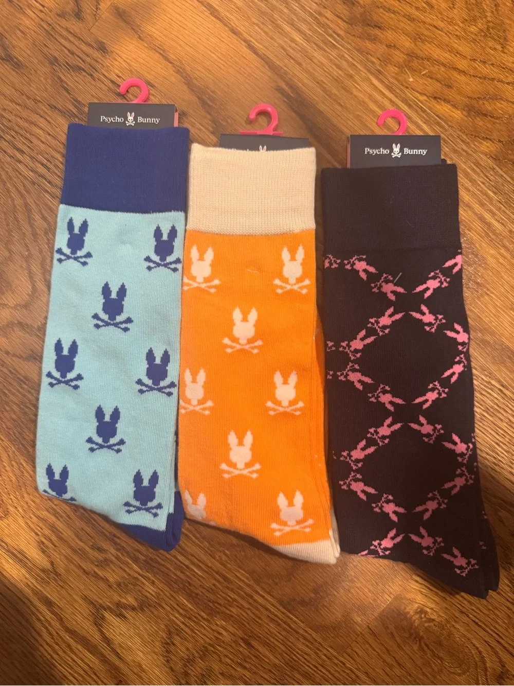 Psycho Bunny Men’s Crew Socks Trio - Light Blue, Orange & Black